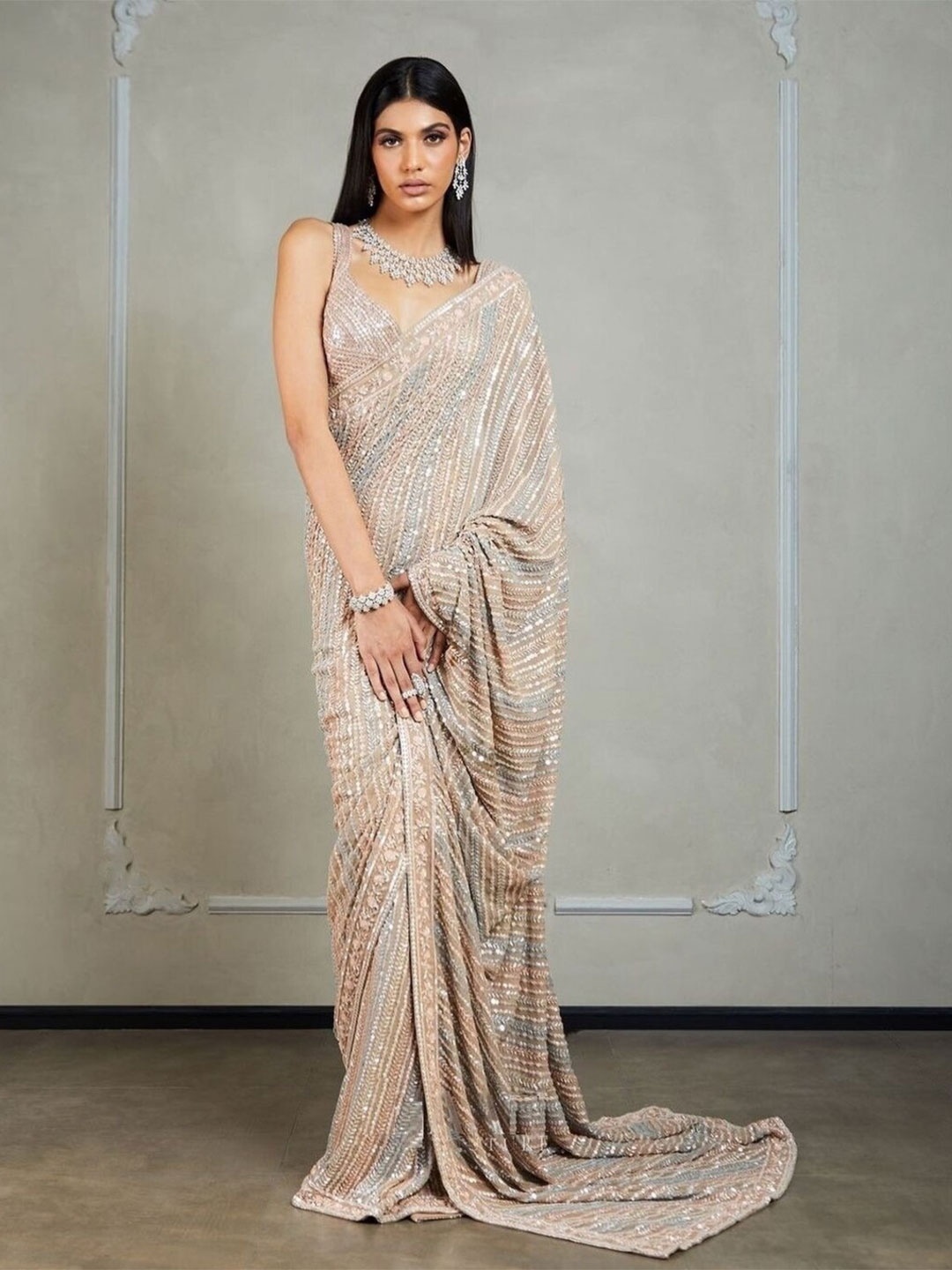 

Bollyclues Sequinned Pure Georgette Saree, Cream