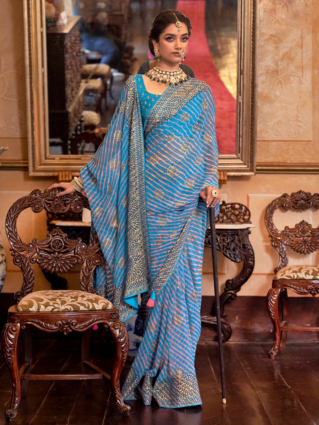 

Mitera Blue Leheriya Printed Zari Poly Georgette Saree