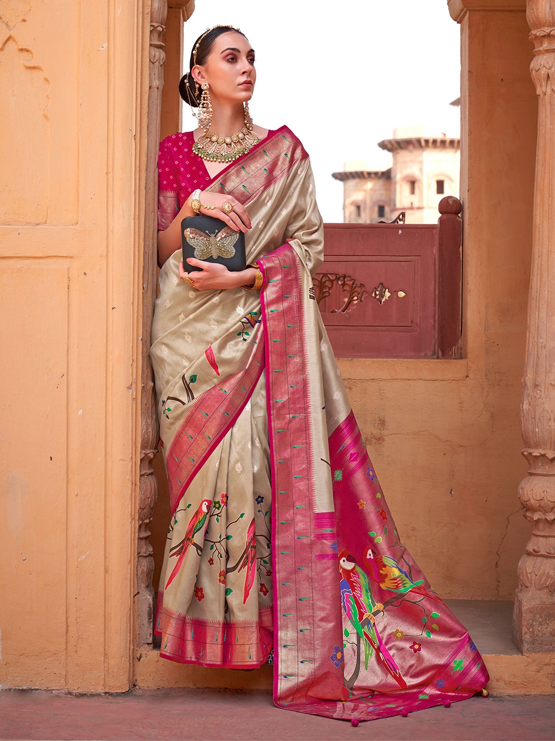 

Mitera Beige Ethnic Motifs Woven Design Zari Poly Silk Saree