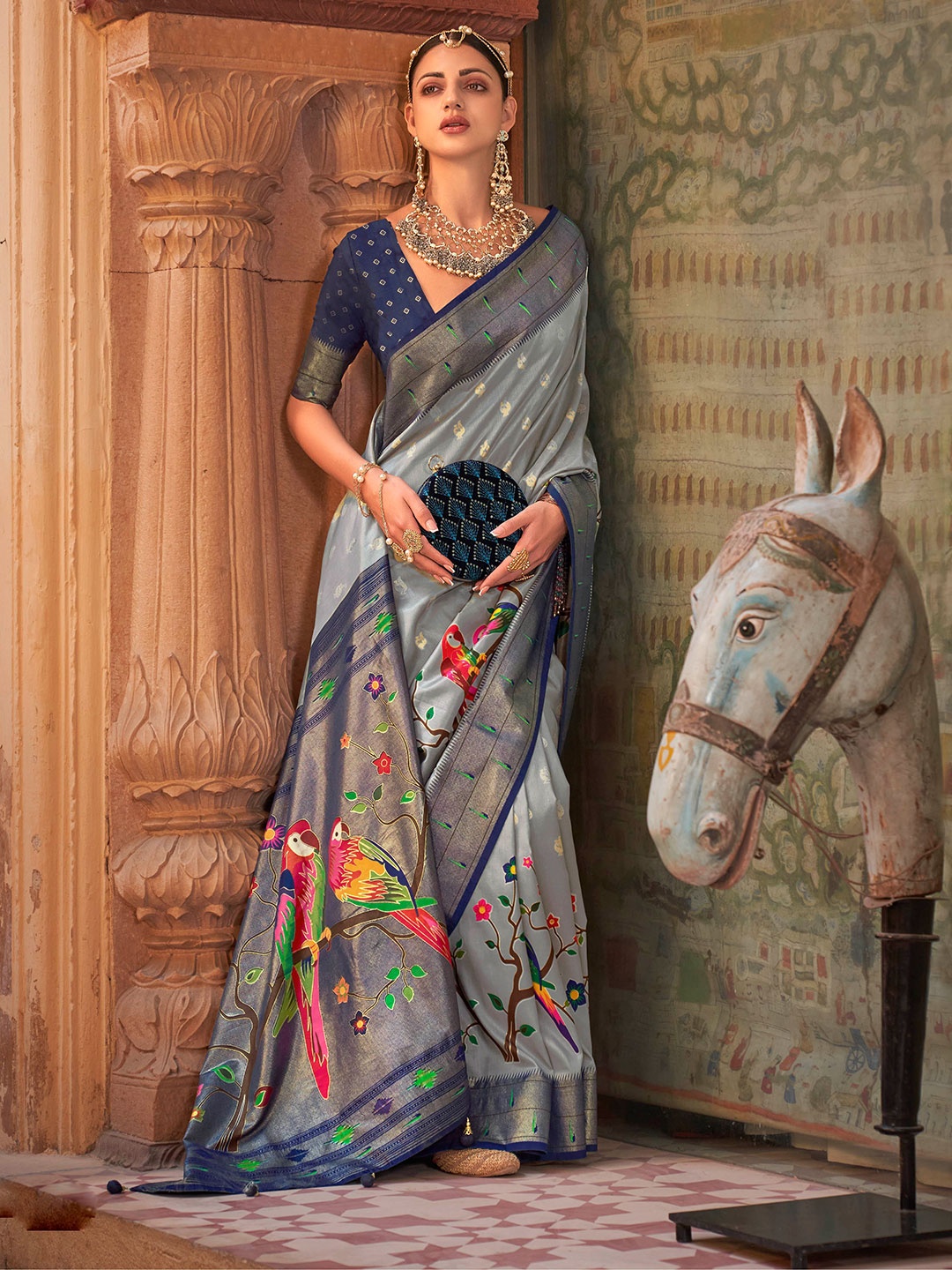 

Mitera Grey & Green Ethnic Woven Design Zari Saree