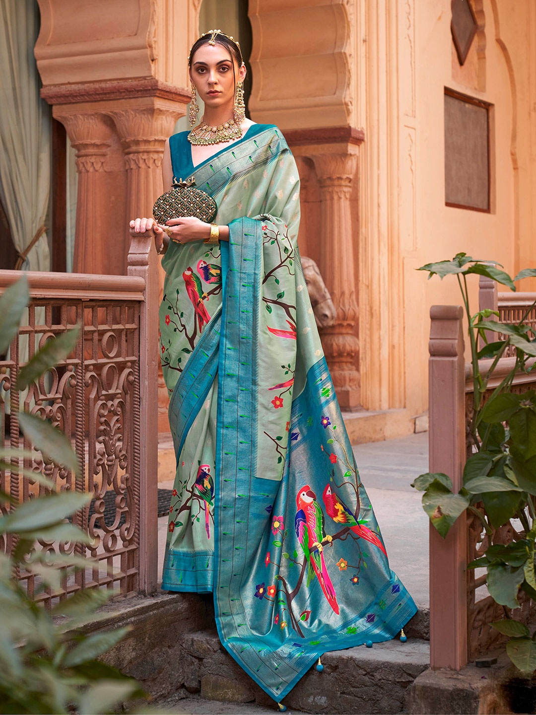 

Mitera Green & Pink Woven Design Ethnic Motifs Zari Saree