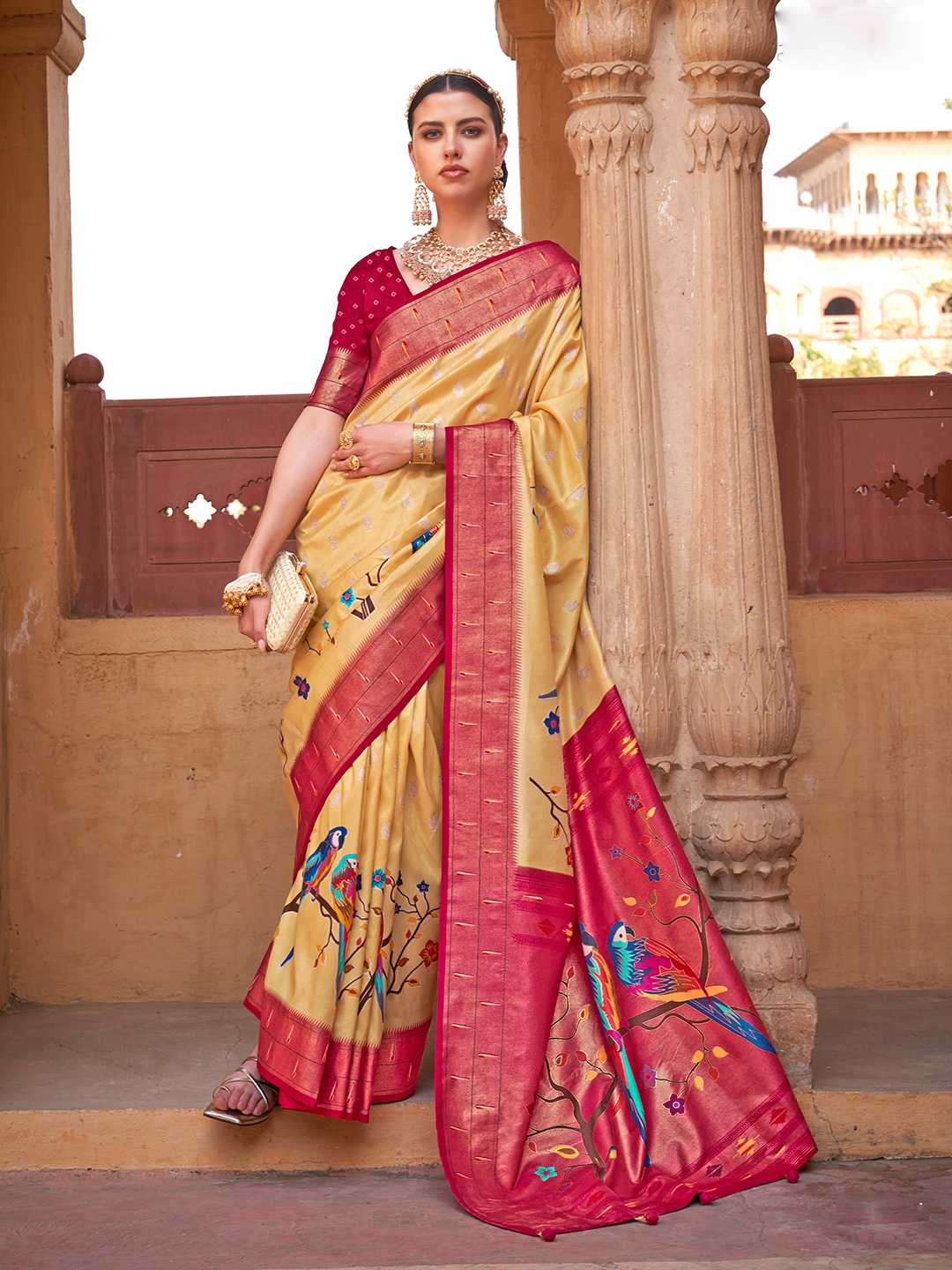 

Mitera Yellow & Pink Ethnic Motifs Woven Design Zari Saree