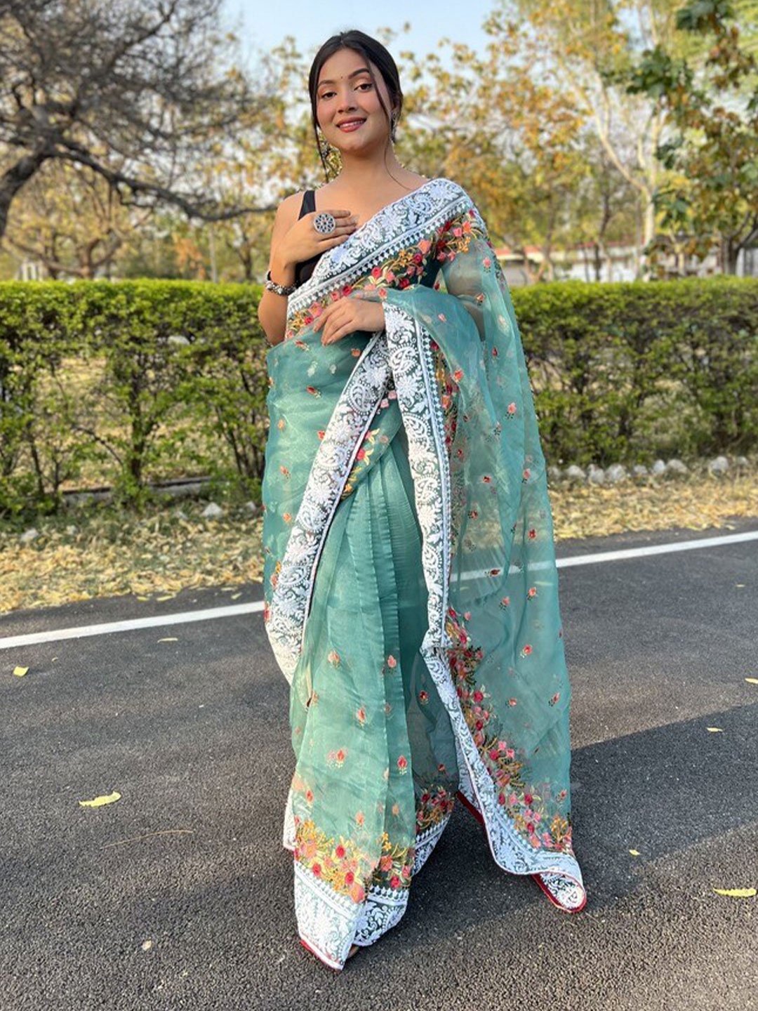 

Atulyam Tex World Floral Embroidered Organza Saree, Sea green
