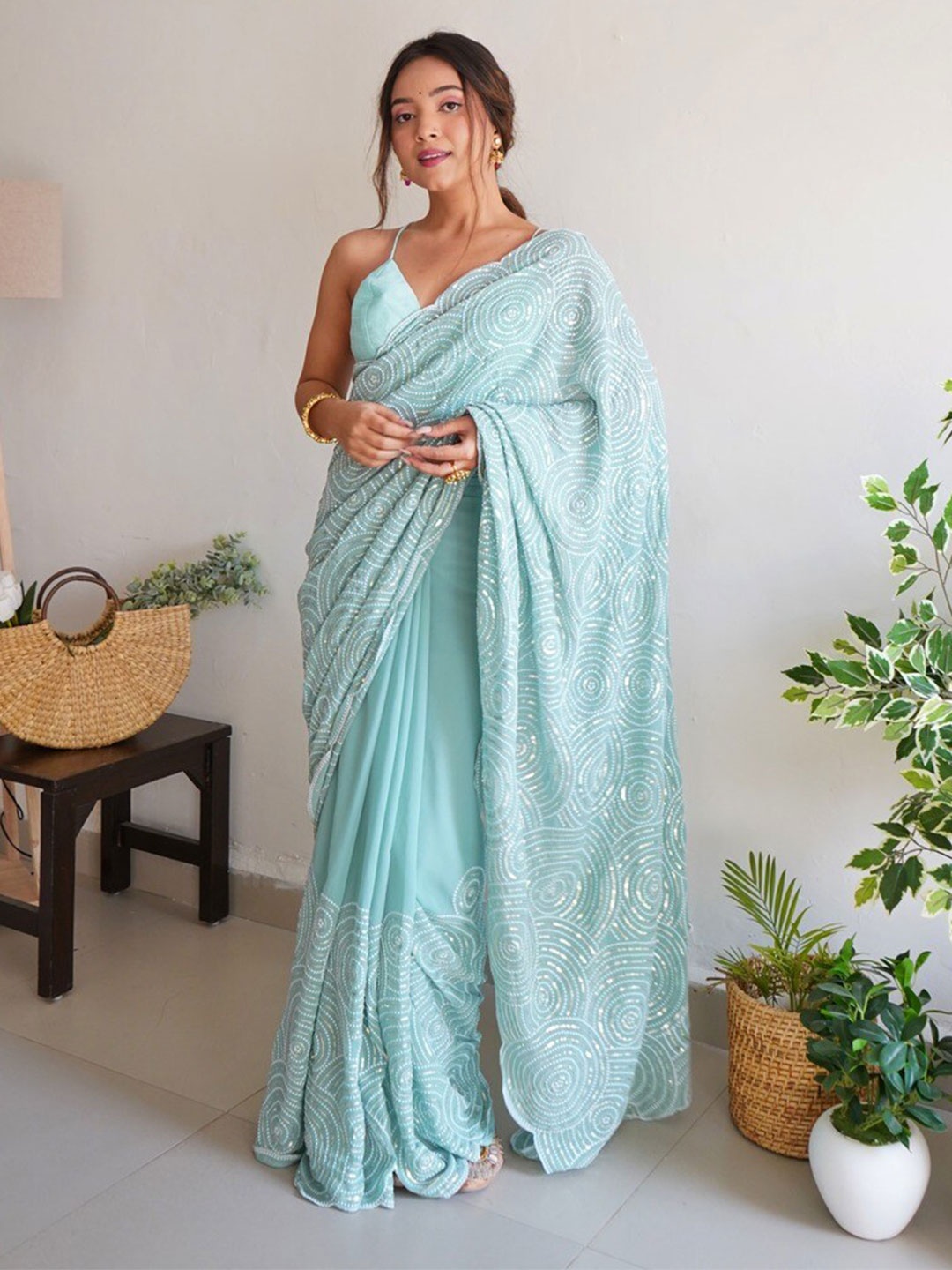 

Atulyam Tex World Embellished Sequinned Pure Georgette Saree, Turquoise blue