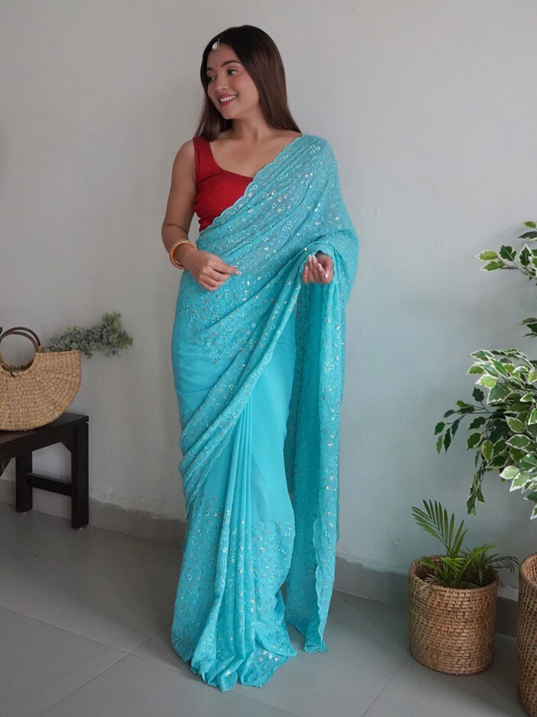 

Atulyam Tex World Floral Sequinned Pure Georgette Saree, Turquoise blue