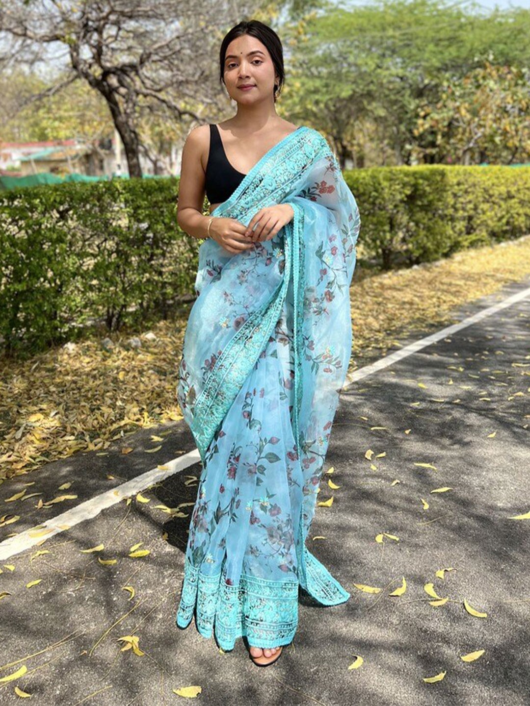 

Atulyam Tex World Floral Printed Embroidered Organza Saree, Turquoise blue