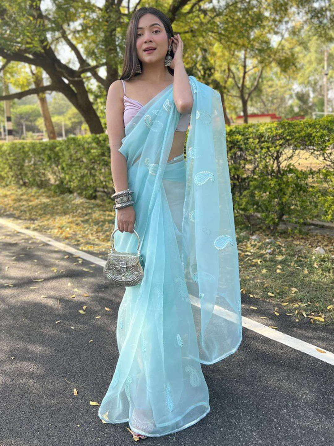 

Atulyam Tex World Paisley Embroidered Organza Saree, Turquoise blue