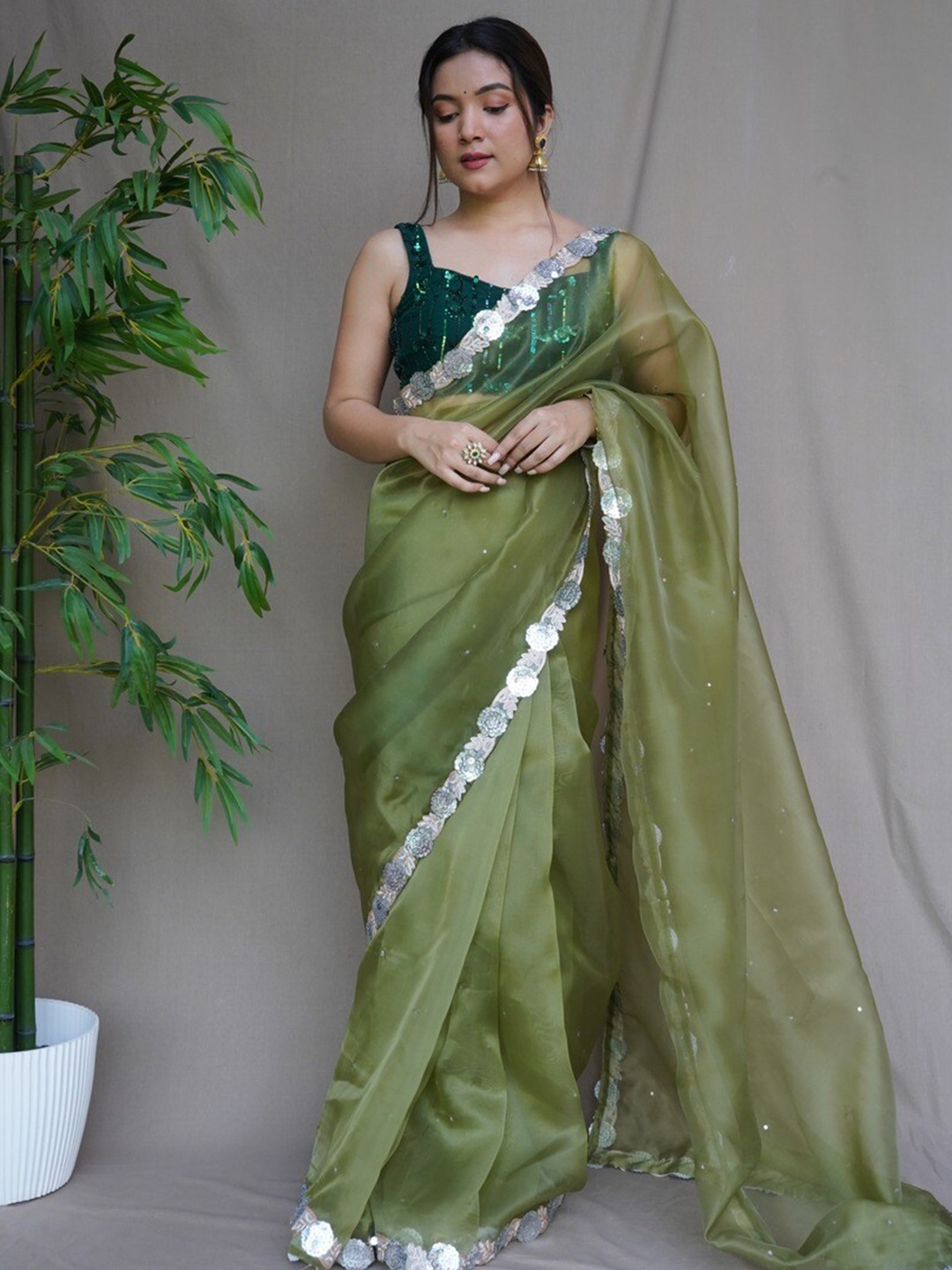 

Atulyam Tex World Sequinned Organza Saree, Green
