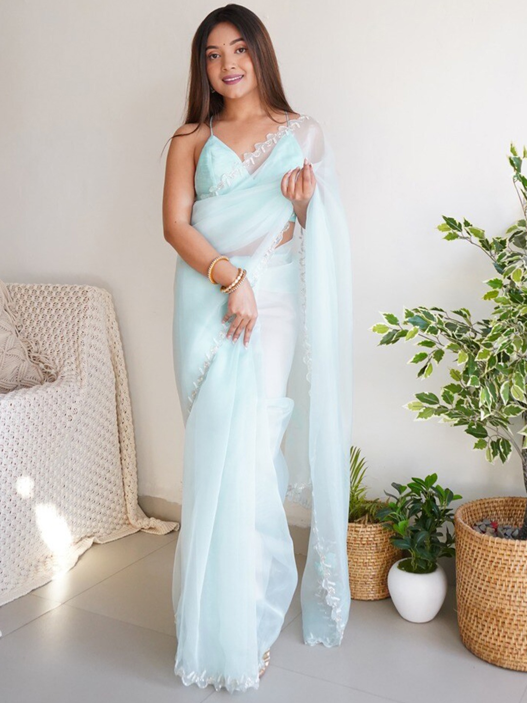 

Atulyam Tex World Beads and Stones Embellished Organza Saree, Turquoise blue