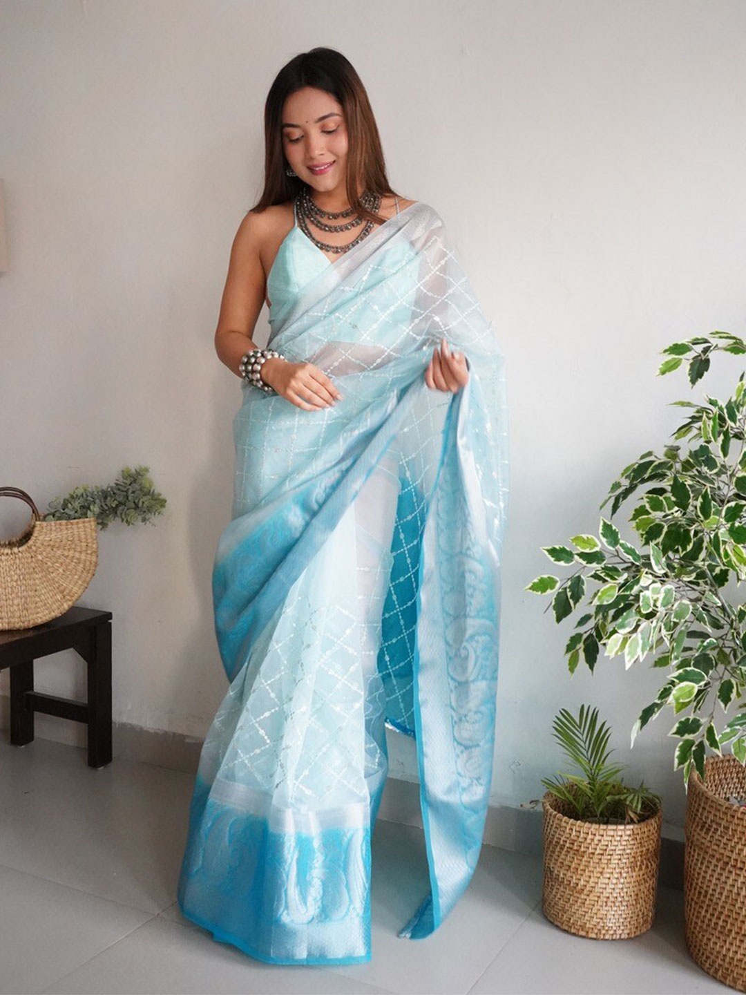 

Atulyam Tex World Geometric Embroidered Zari Organza Saree, Blue
