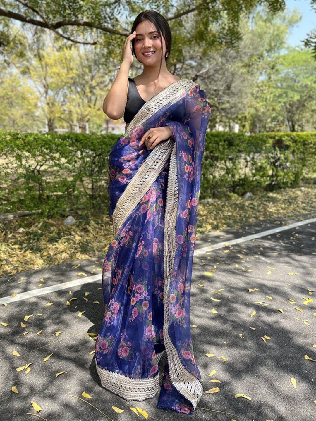 

Atulyam Tex World Floral Printed Embroidered Organza Saree, Navy blue