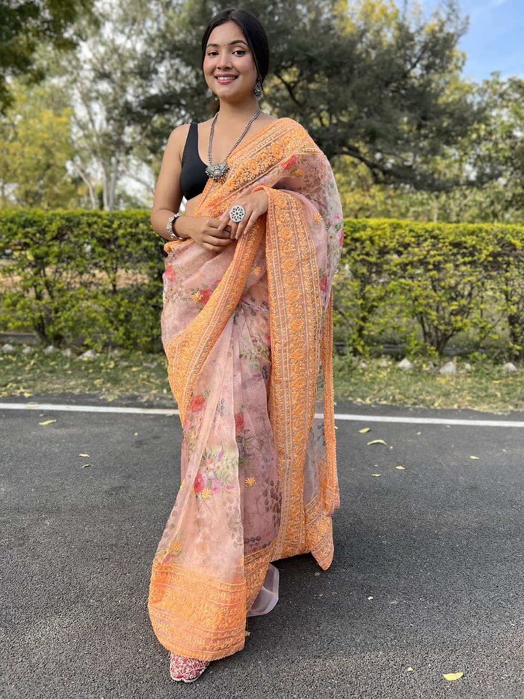 

Atulyam Tex World Floral Embroidered Organza Designer Saree, Orange