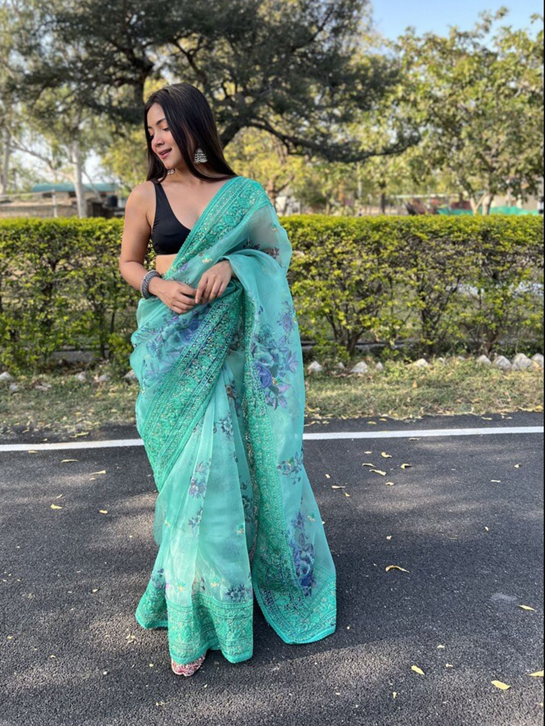 

Atulyam Tex World Floral Embroidered Organza Saree, Turquoise blue