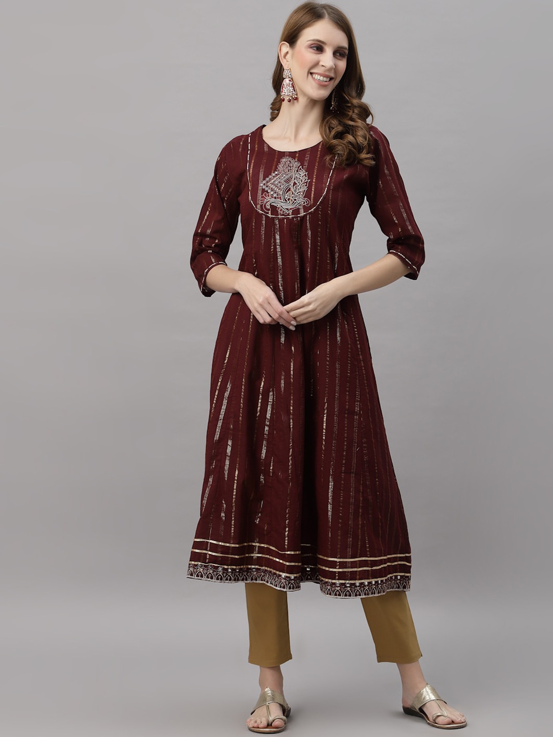 

Ragavi Striped Yoke Design Thread Work A-Line Kurta, Maroon