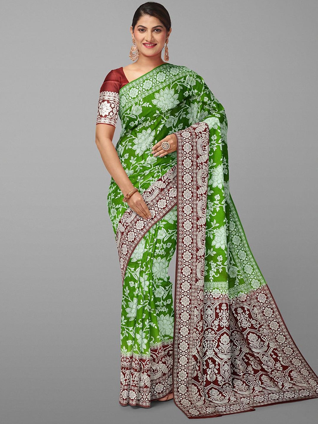 

Kalamandir Ethnic Motifs Woven Design Zari Silk Blend Saree, Green