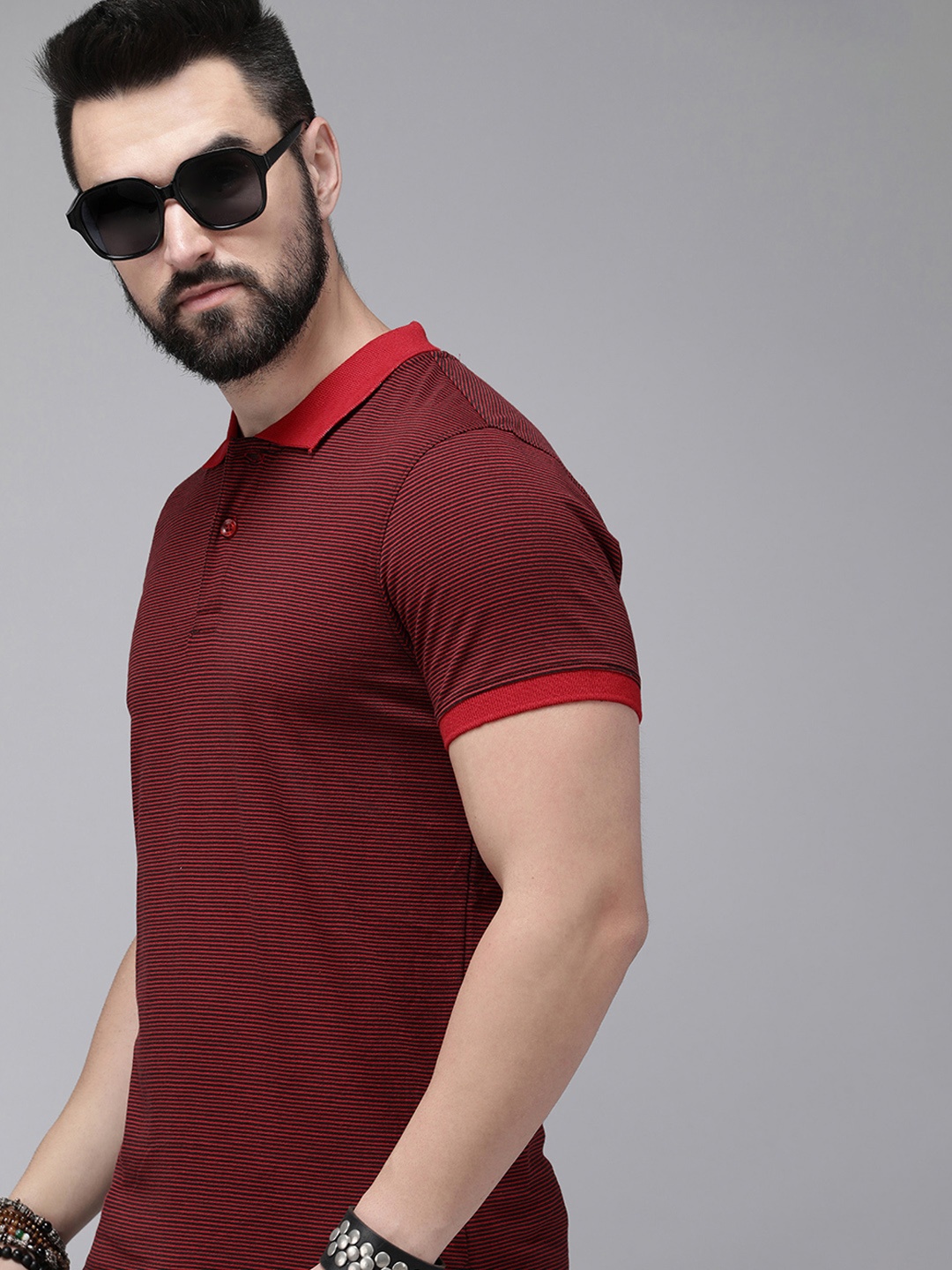 

Roadster Men Striped Polo Collar T-shirt, Red