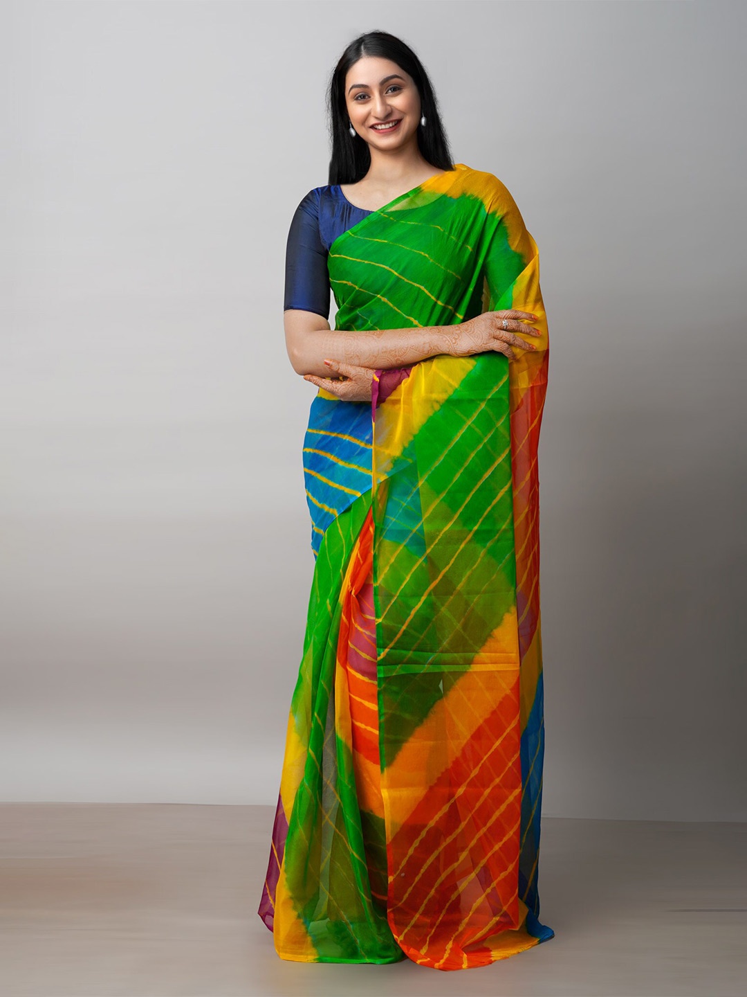 

Unnati Silks Green & Blue Leheriya Poly Chiffon Leheriya Saree
