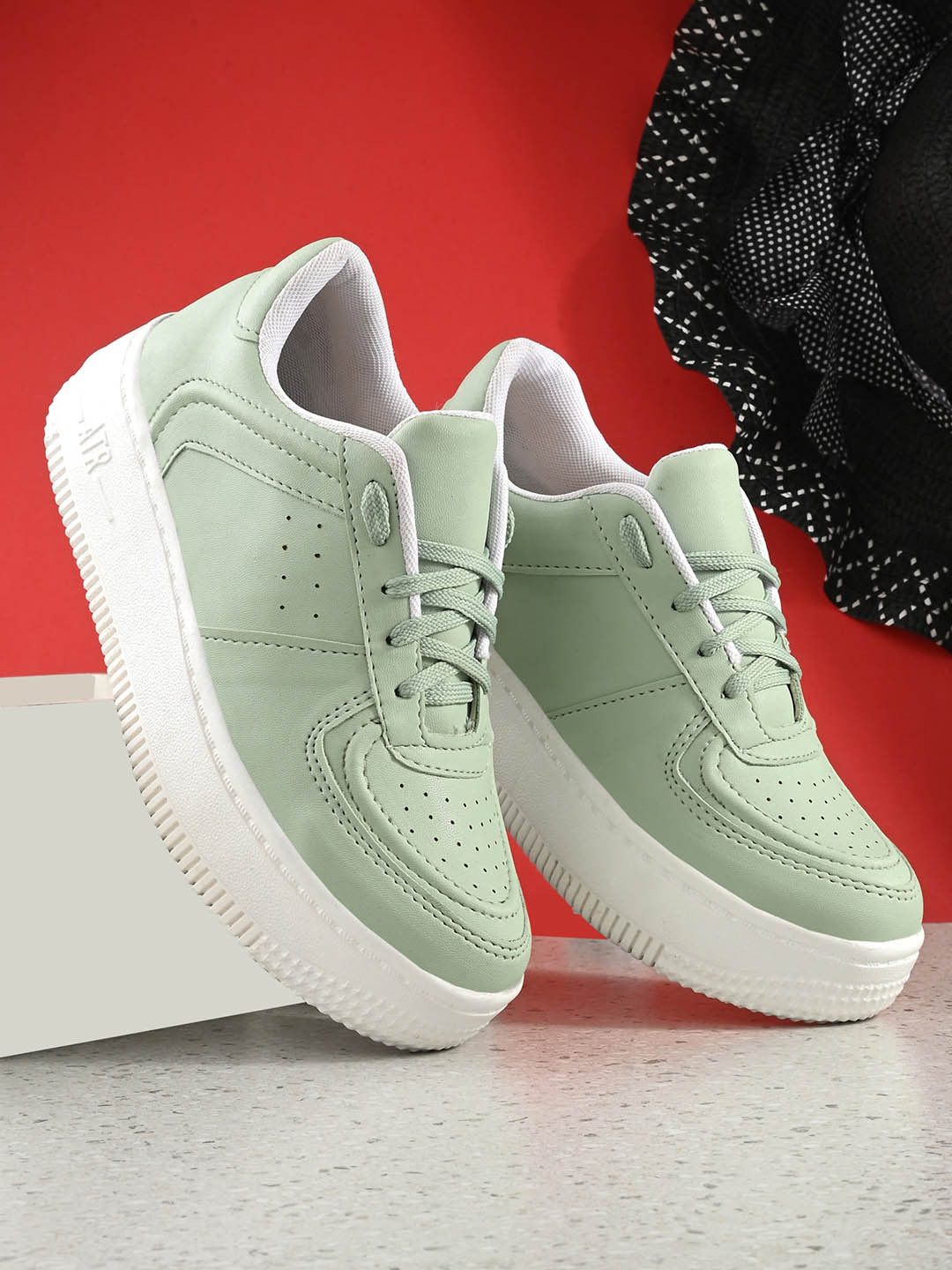 

AfroJack Women Perforated Contrast Sole Sneakers, Sea green