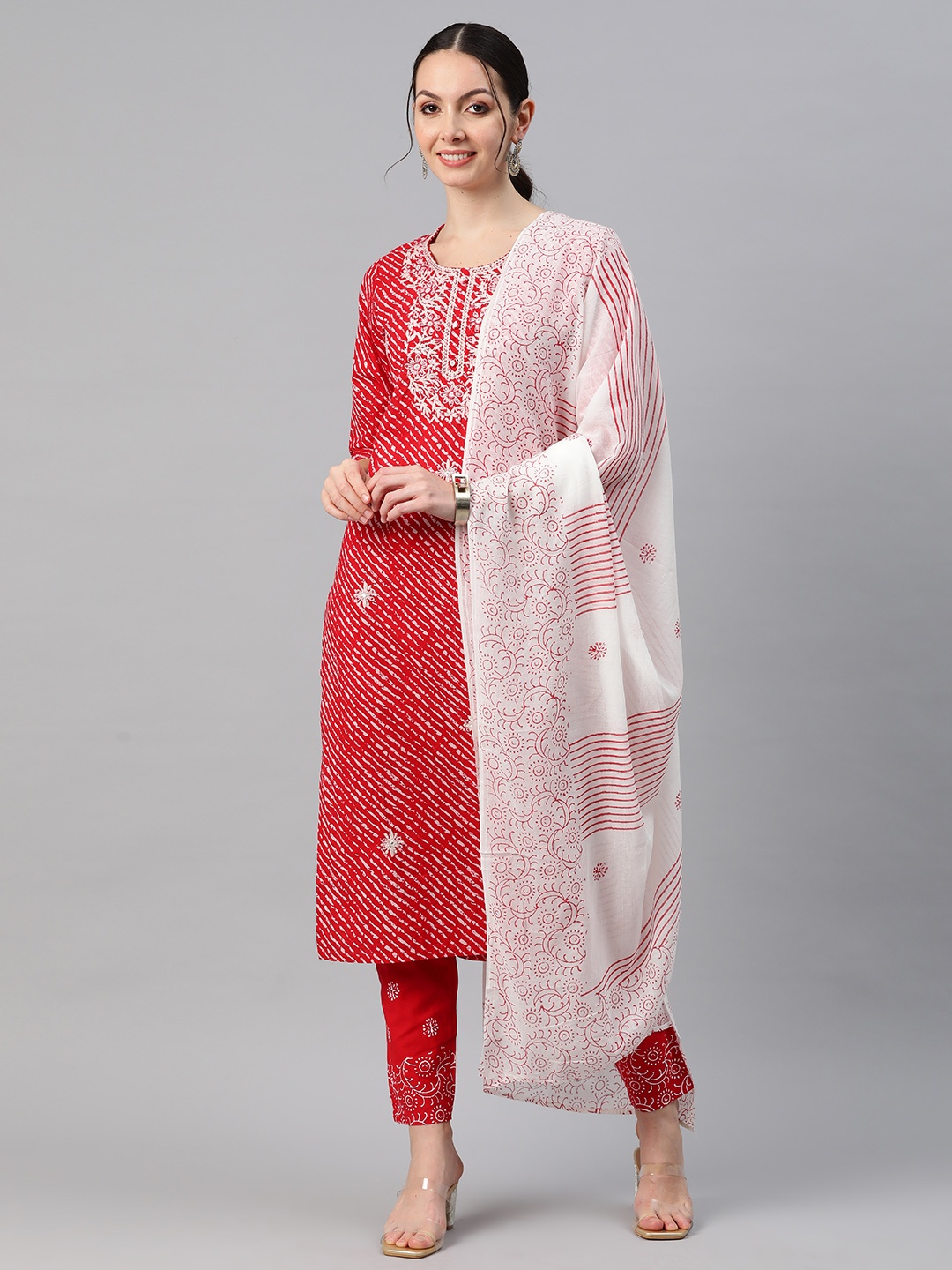 

Readiprint Fashions Women Leheriya Printed Thread Work Kurta with Trousers & With Dupatta, Red