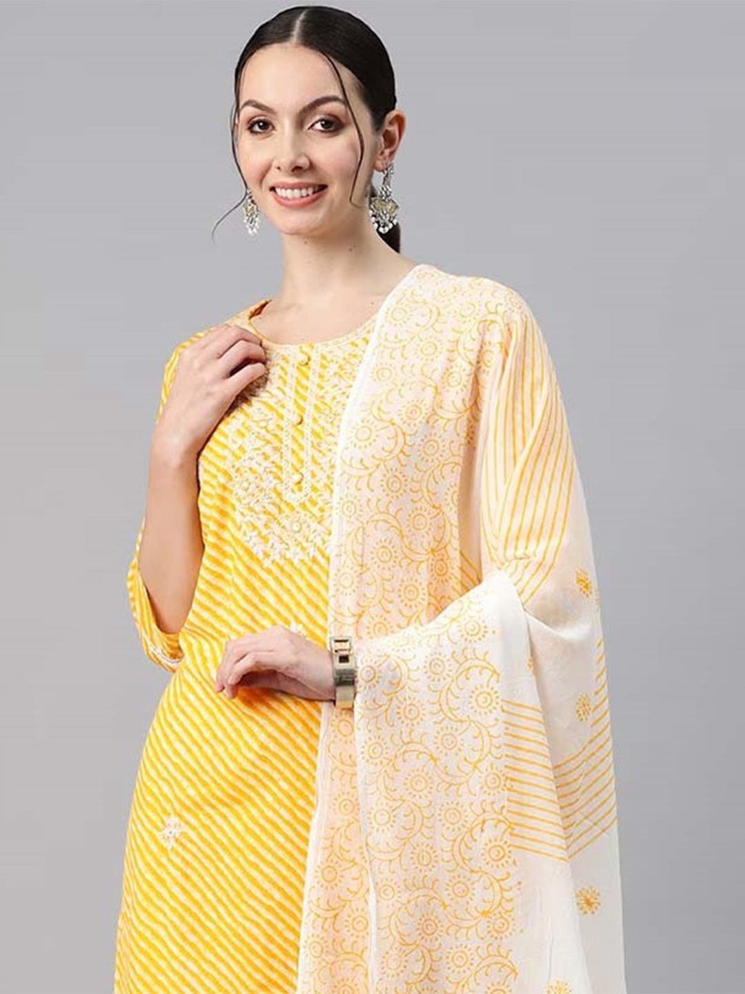 

Readiprint Fashions Women Leheriya Printed Thread Work Kurta with Trousers & With Dupatta, Yellow