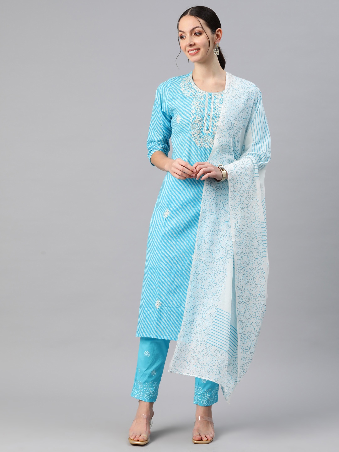 

Readiprint Fashions Women Leheriya Printed Thread Work Kurta with Trousers & With Dupatta, Blue
