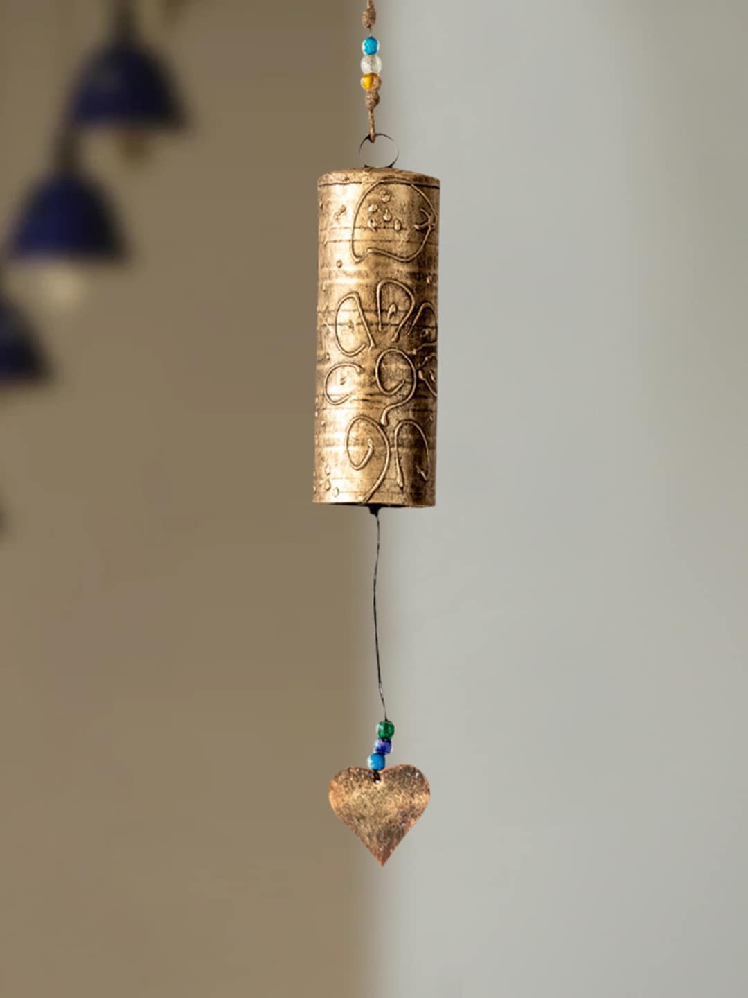 

ExclusiveLane Sonorous Ghantadi Kutch Decorative Hanging Wind Chime, Gold