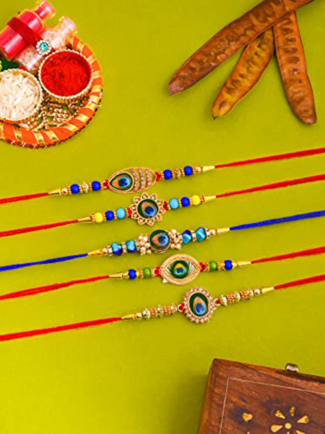 

Perpetual Set Of 5 Thread Rakhi, Dora Rakhi for Brother and Bhabhi, With Rakhi Thali, Red