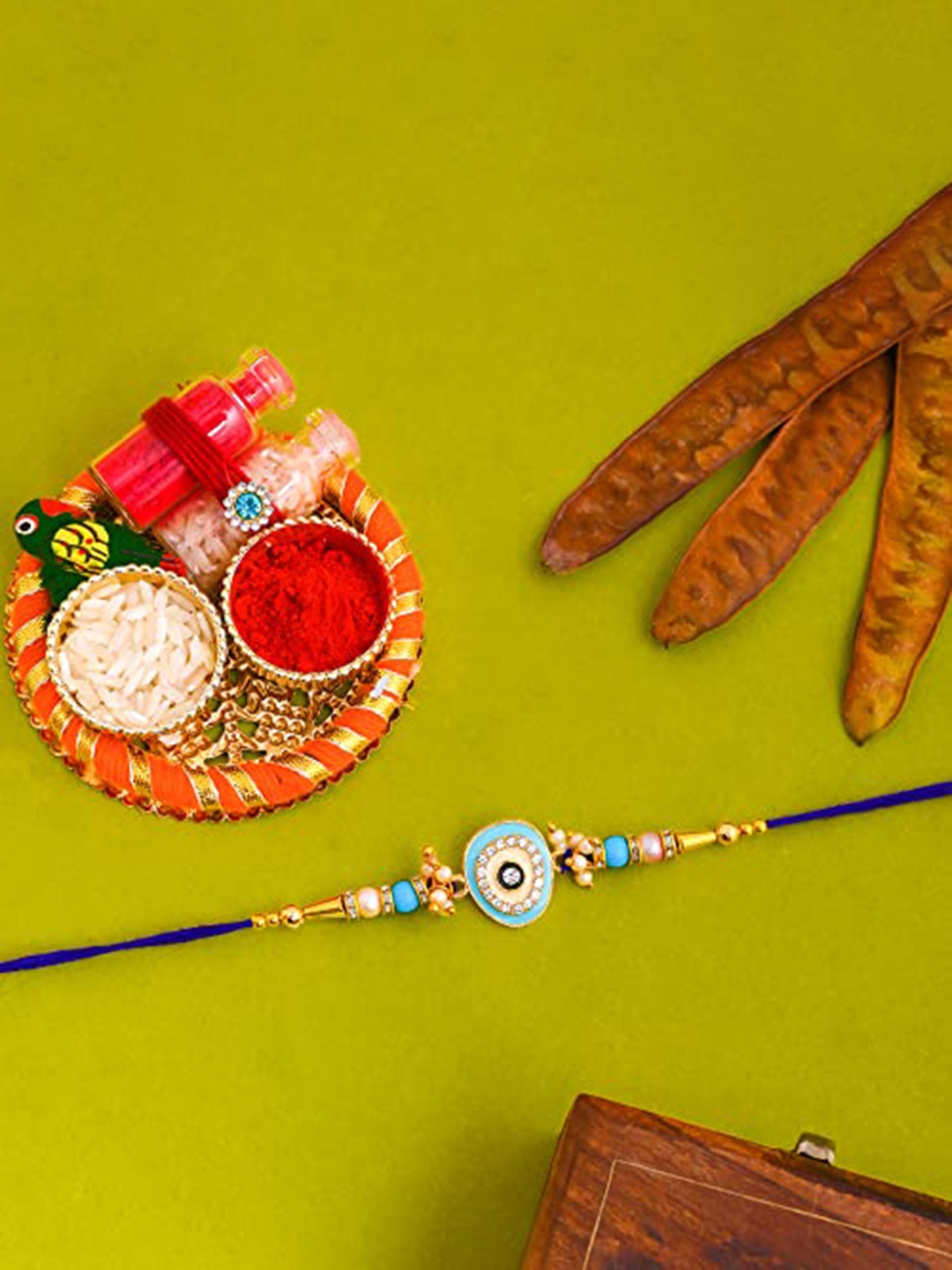 

Perpetual Evil Eye Thread Rakhi For Brother And Bhabhi, Blue