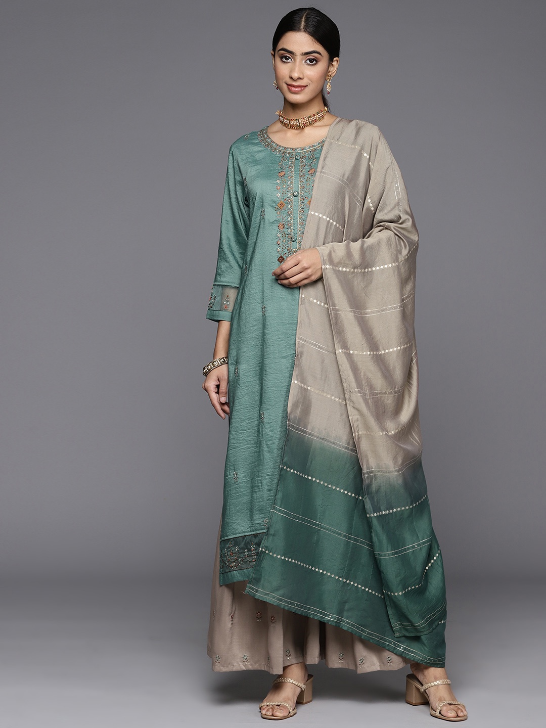 

Varanga Women Floral Embroidered Regular Sequinned Kurta with Sharara & With Dupatta, Turquoise blue