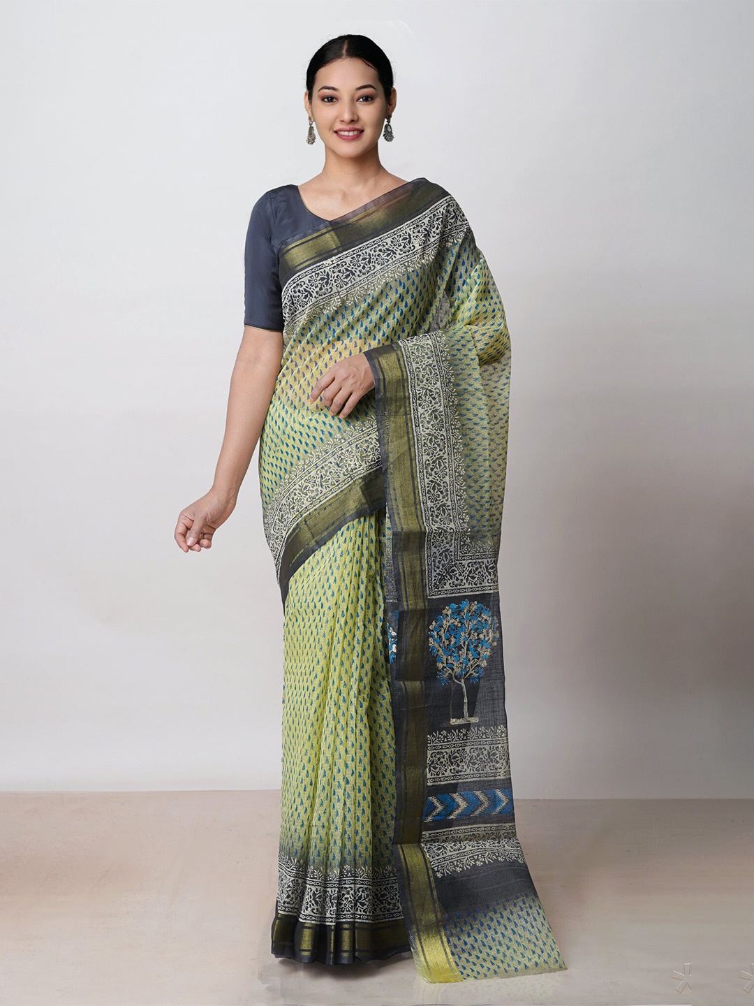 

Unnati Silks Ethnic Motifs Printed Zari Pure Cotton Kota Saree, Green