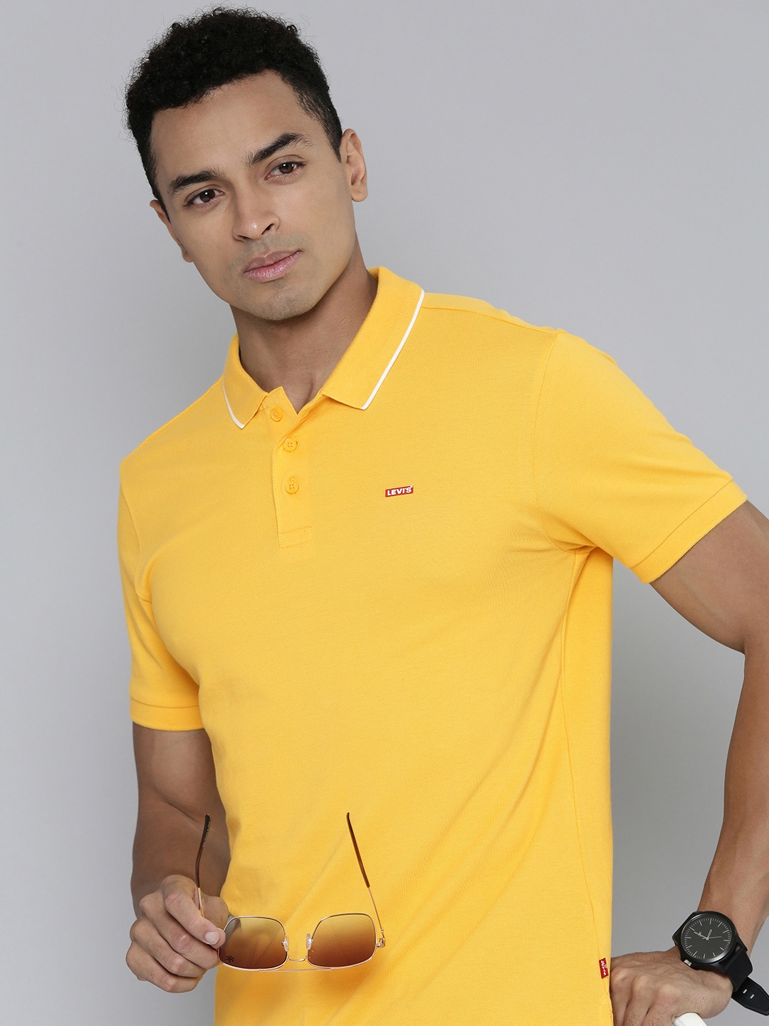 

Levis Men Solid Polo Collar Pure Cotton T-shirt, Yellow