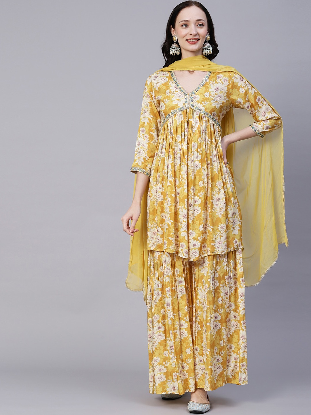 

FASHOR Yellow Floral Printed Pleated Mirror Work Kurti With Sharara & Dupatta