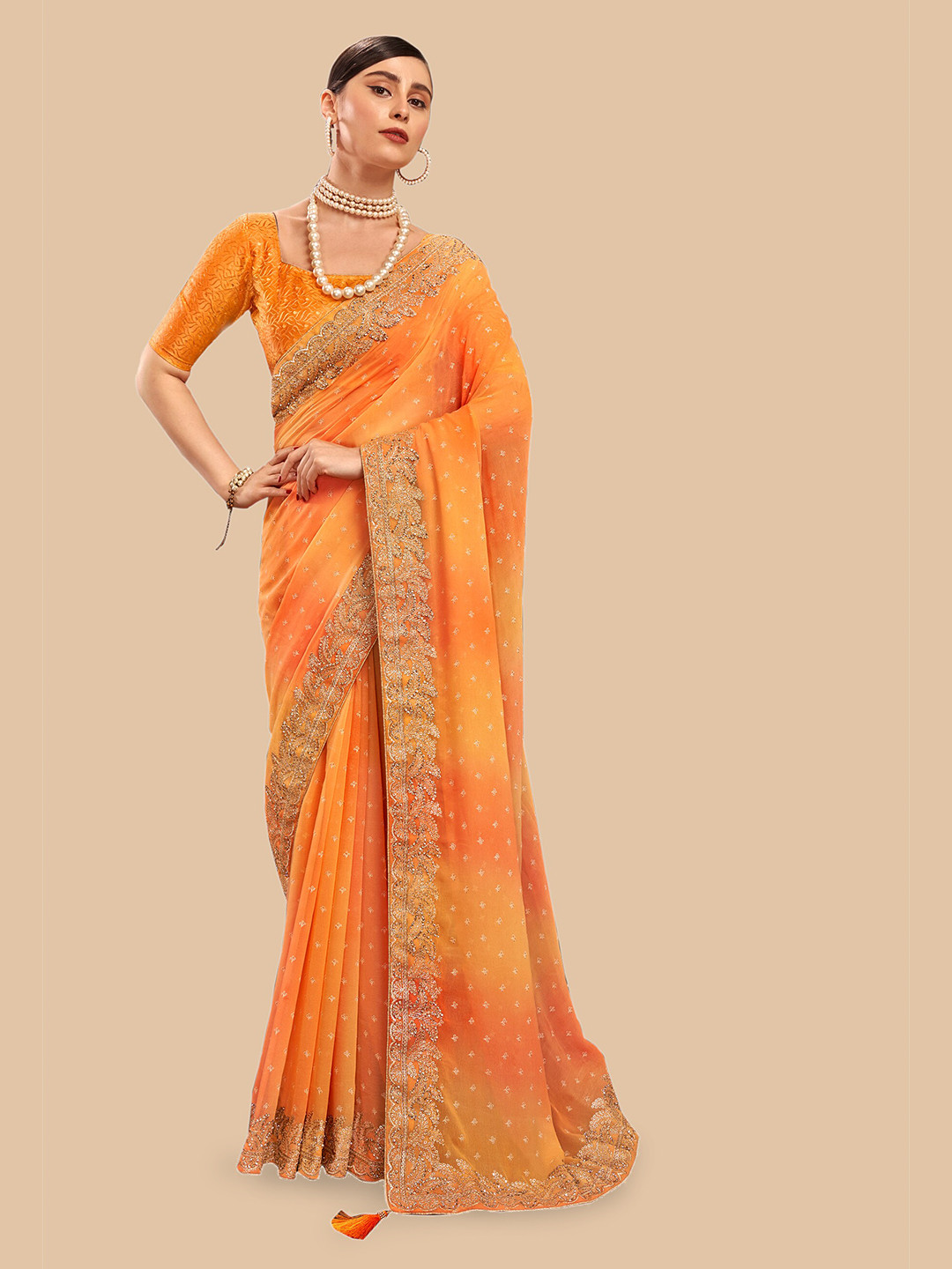 

Triveni Ethnic Motifs Embroidered Pure Georgette Saree, Orange