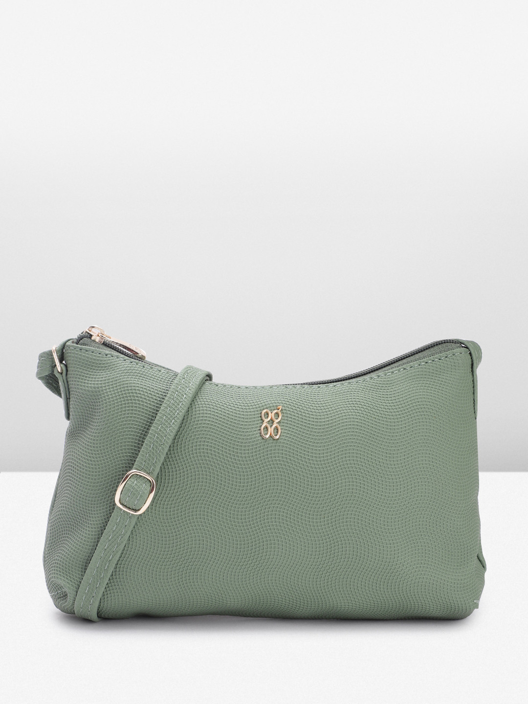 

Baggit Micro Geometric Textured PU Structured Sling Bag, Green