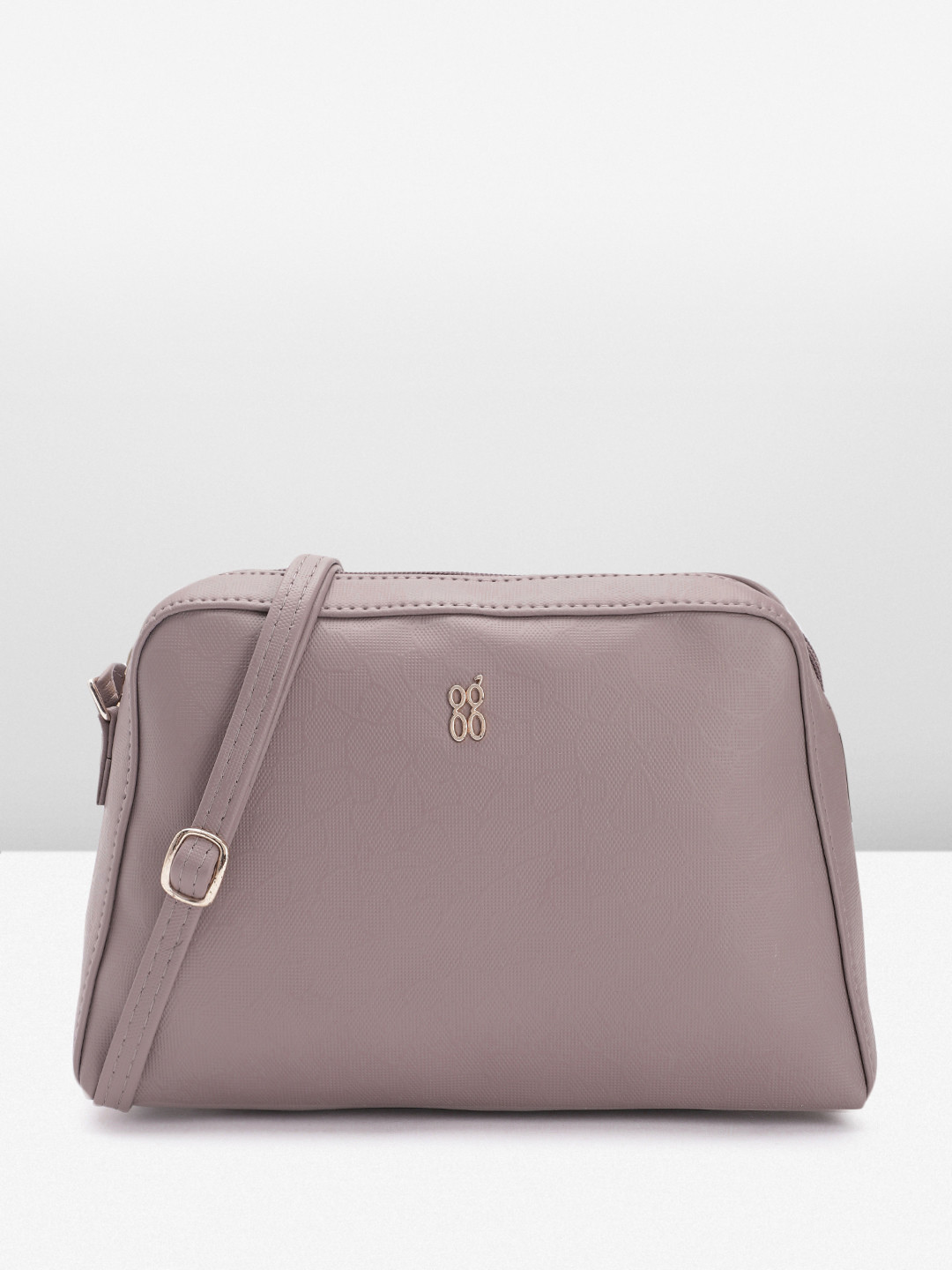 

Baggit Women Solid Sling Bag, Rose