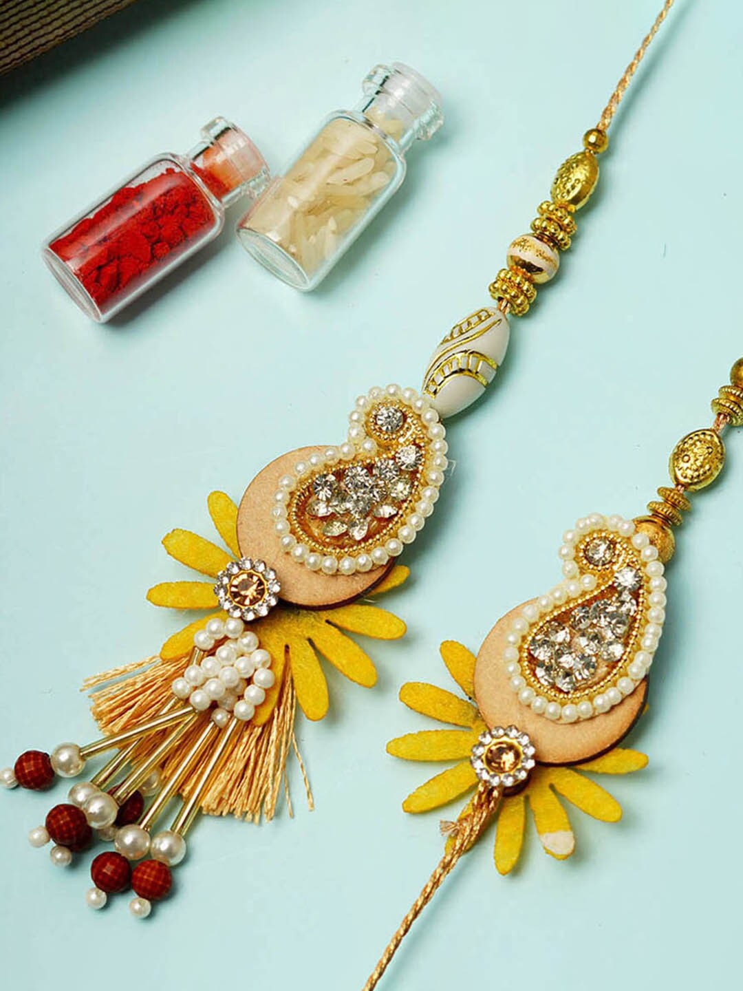 

Urmika Set Of 2 Almond Gotta Work Rakhi, Gold