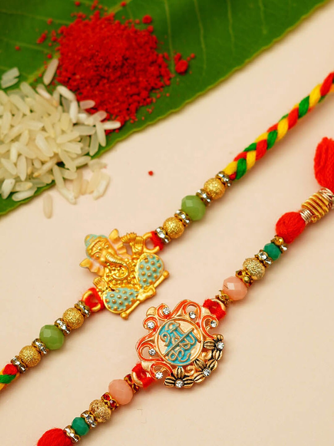 

Urmika Set Of 2 Shri Ganesh & Shri Krishna Beaded Rakhi, Yellow