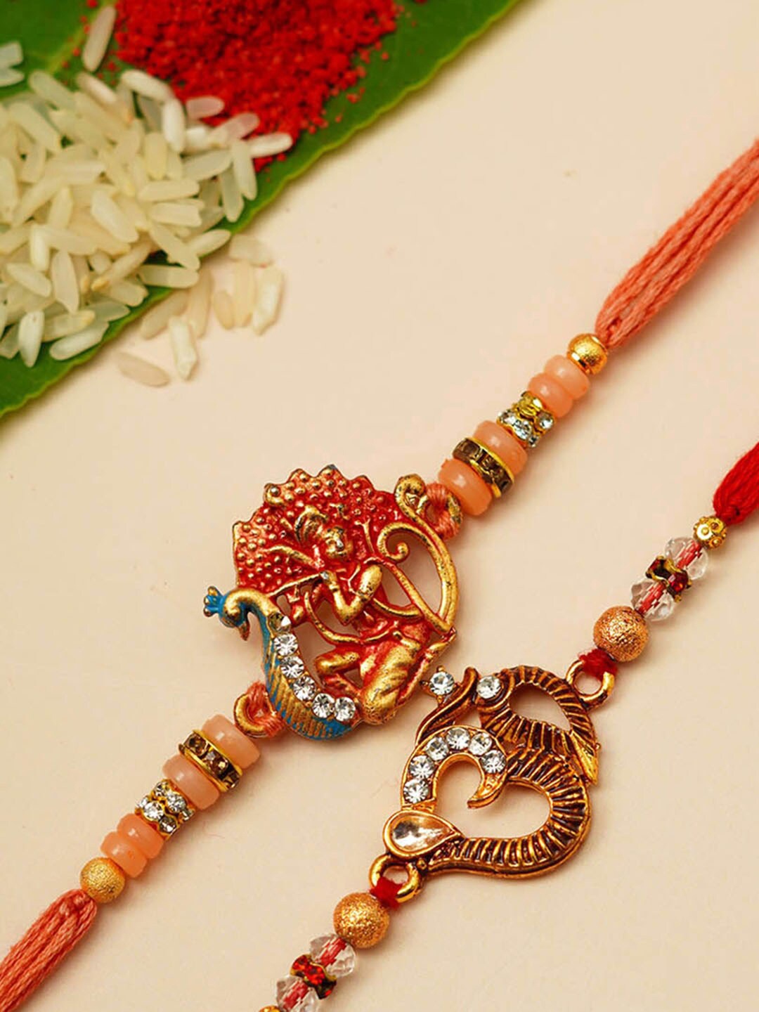 

Urmika Set Of 2 Red Om & Kartikeya Rakhi