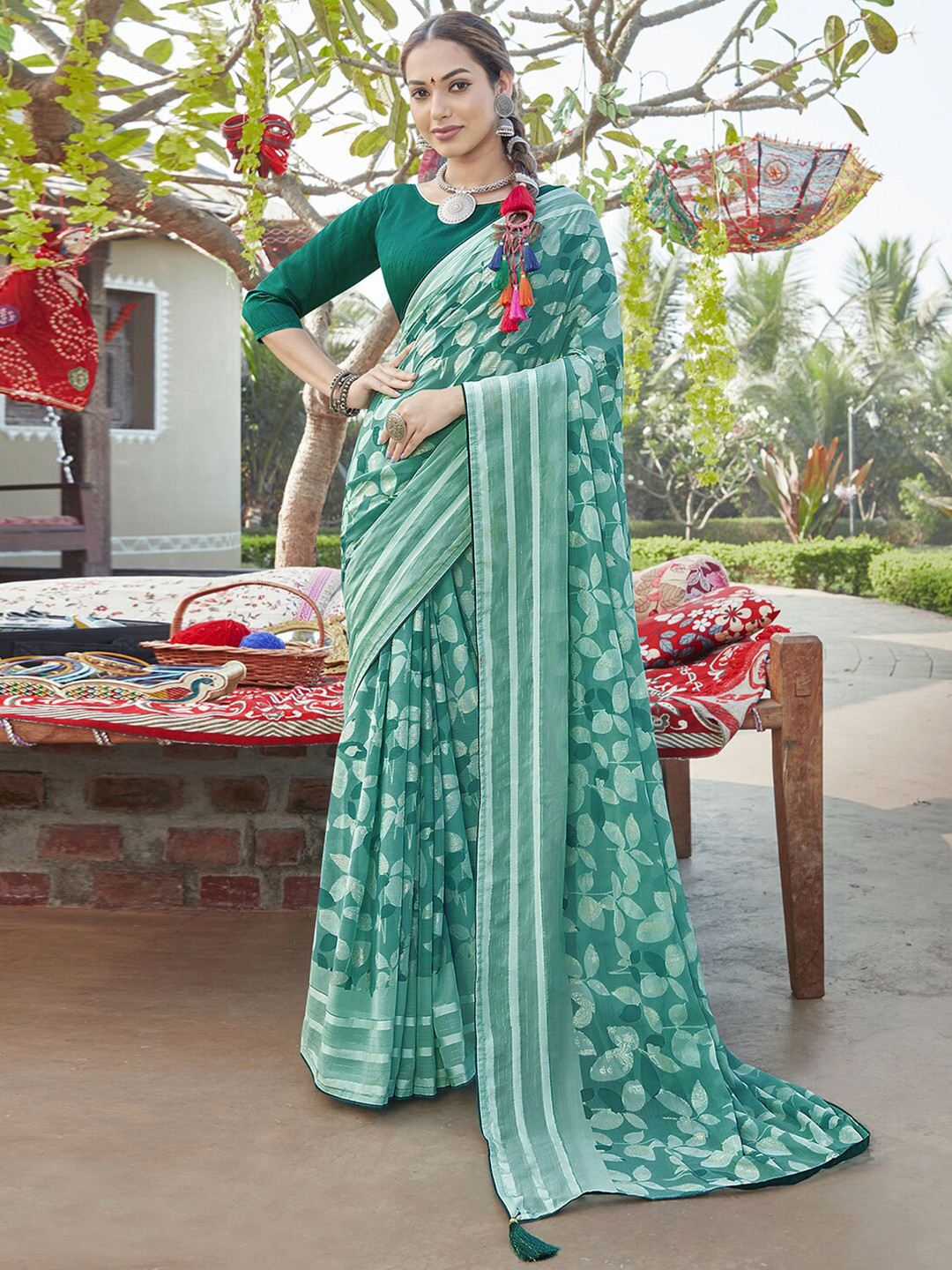 

Satrani Turquoise Blue & Gold-Toned Floral Poly Chiffon Saree