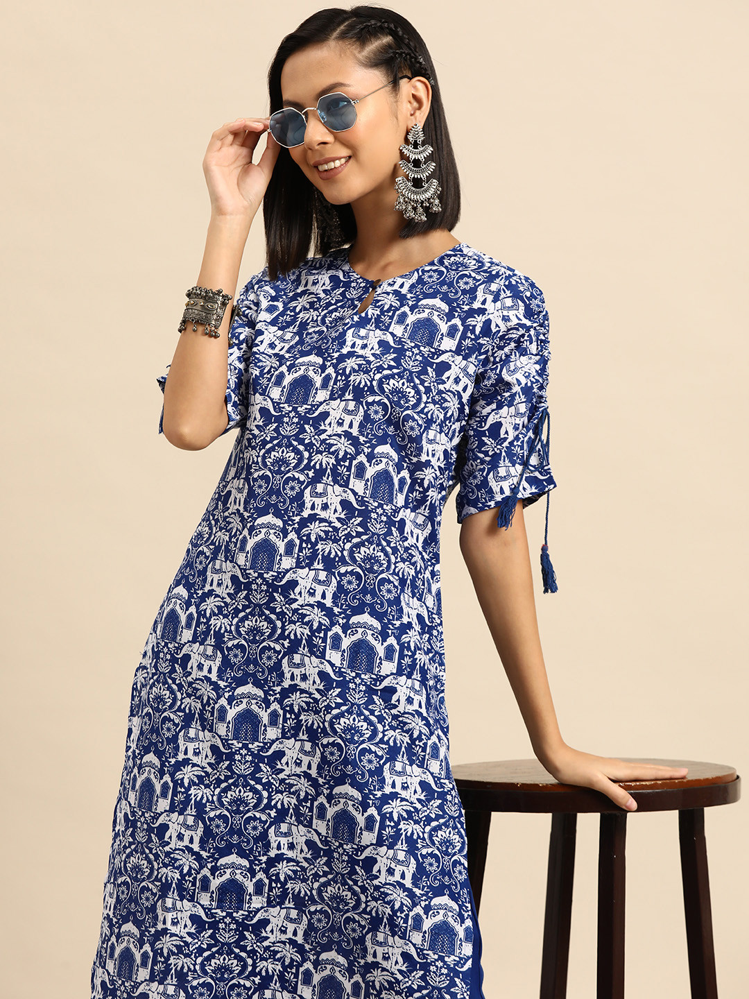 

Sangria Women Ethnic Motifs Printed Regular Kurta with Trousers, Blue