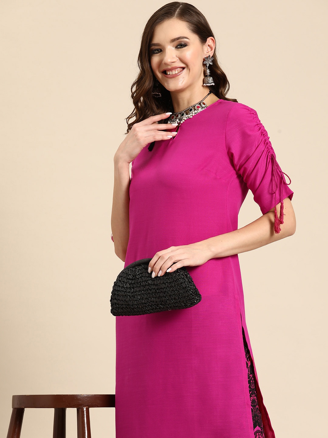 

Sangria Women Solid Kurta with Floral Trousers, Pink