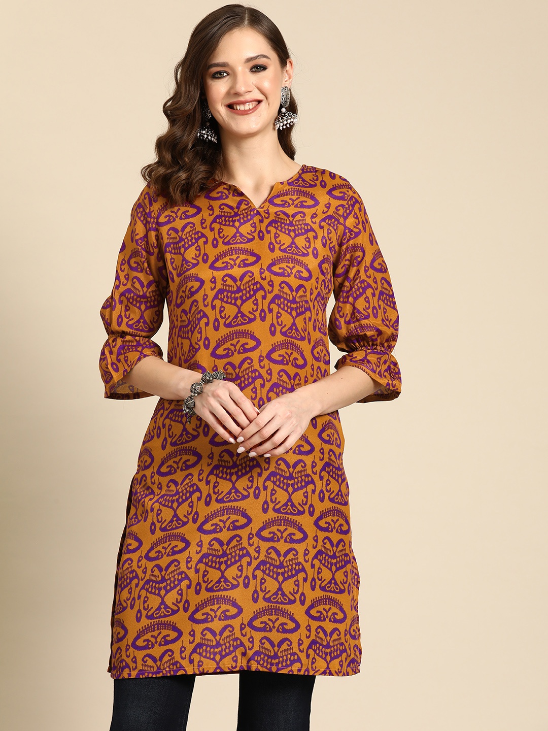 

Sangria Ethnic Motifs Printed Bell Sleeves Kurta, Rust