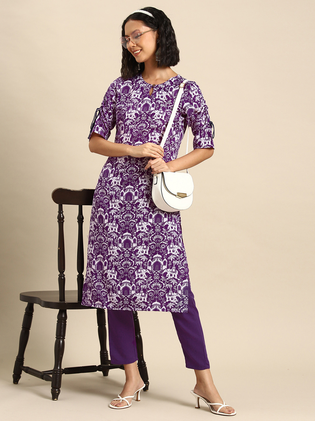 

Sangria Women Ethnic Motifs Printed Regular Kurta with Trousers, Purple