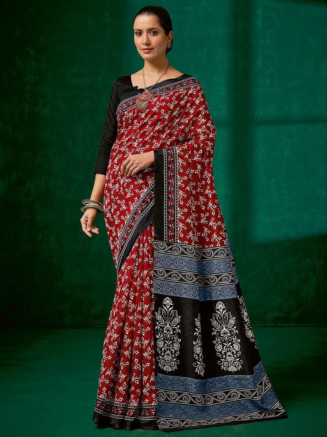 

Mitera Maroon & Black Floral Printed Bagh Saree