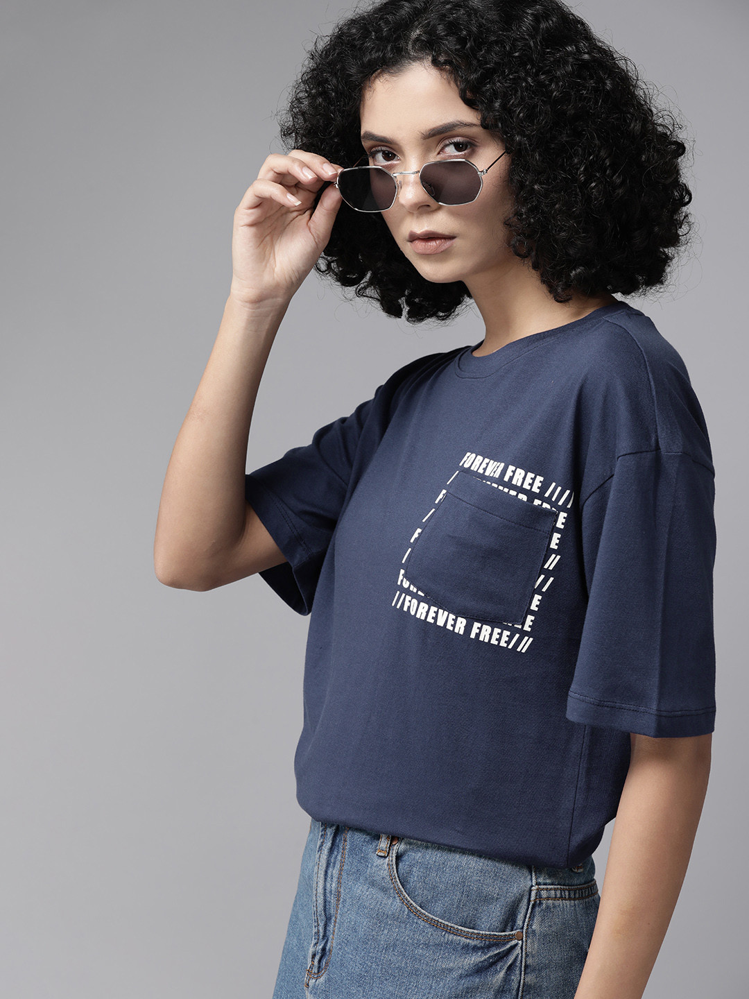 

The Roadster Lifestyle Co. Women Printed Drop-Shoulder Sleeves Cotton Pocket T-shirt, Navy blue