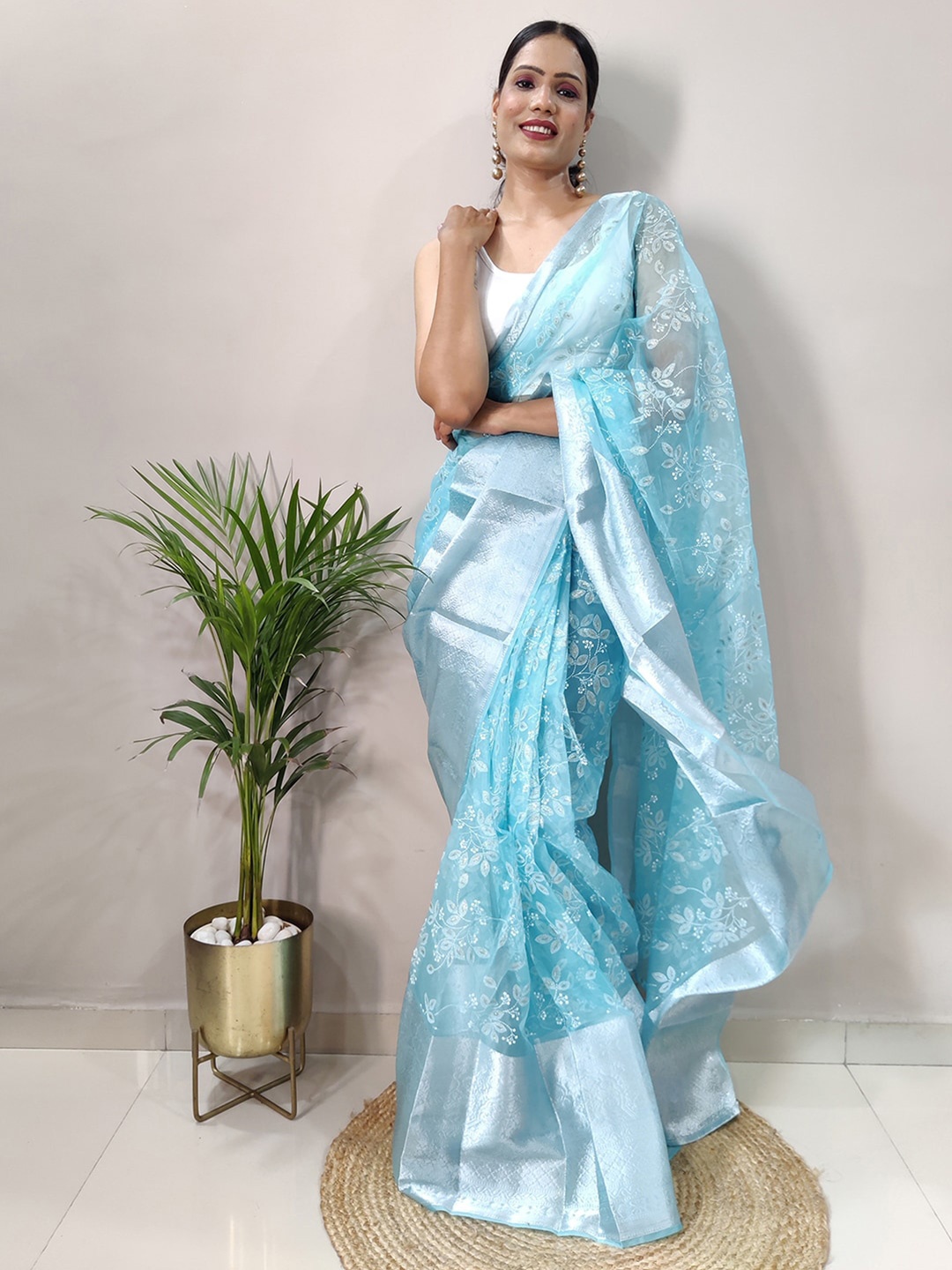 

Mitera Blue & Silver-Toned Floral Zari Organza Saree