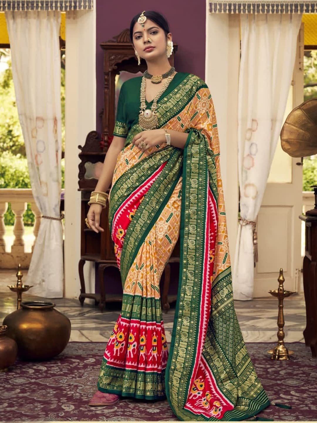 

Mitera Peach-Coloured & Green Ethnic Motifs Woven Design Zari Saree