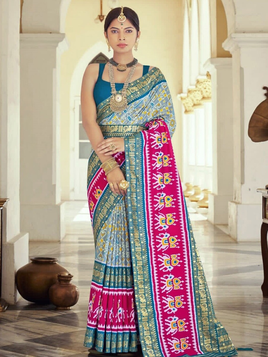 

Mitera Blue & Pink Printed Silk Blend Belted Saree