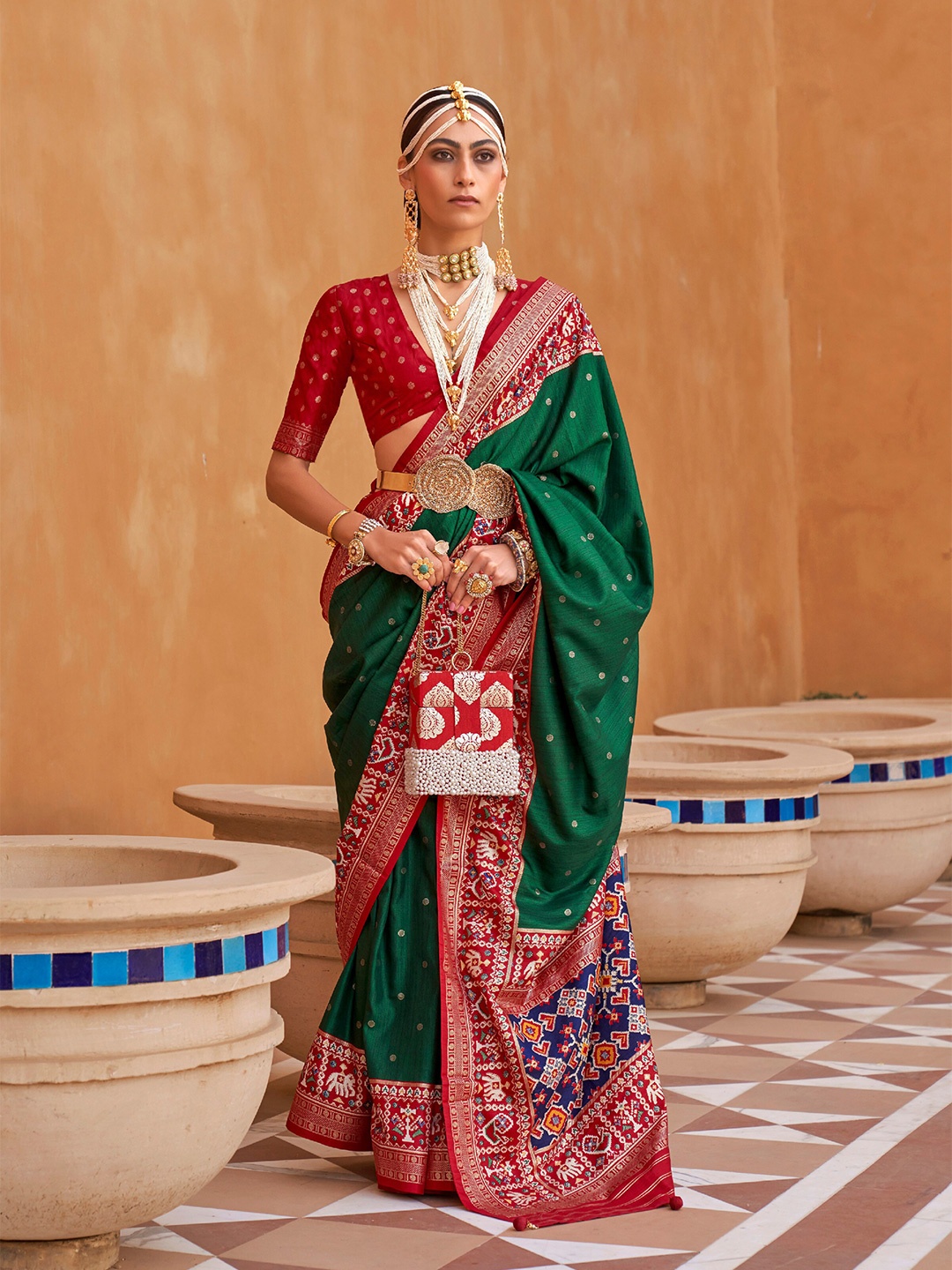 

Mitera Green & Red Ethnic Motifs Woven Design Zari Saree