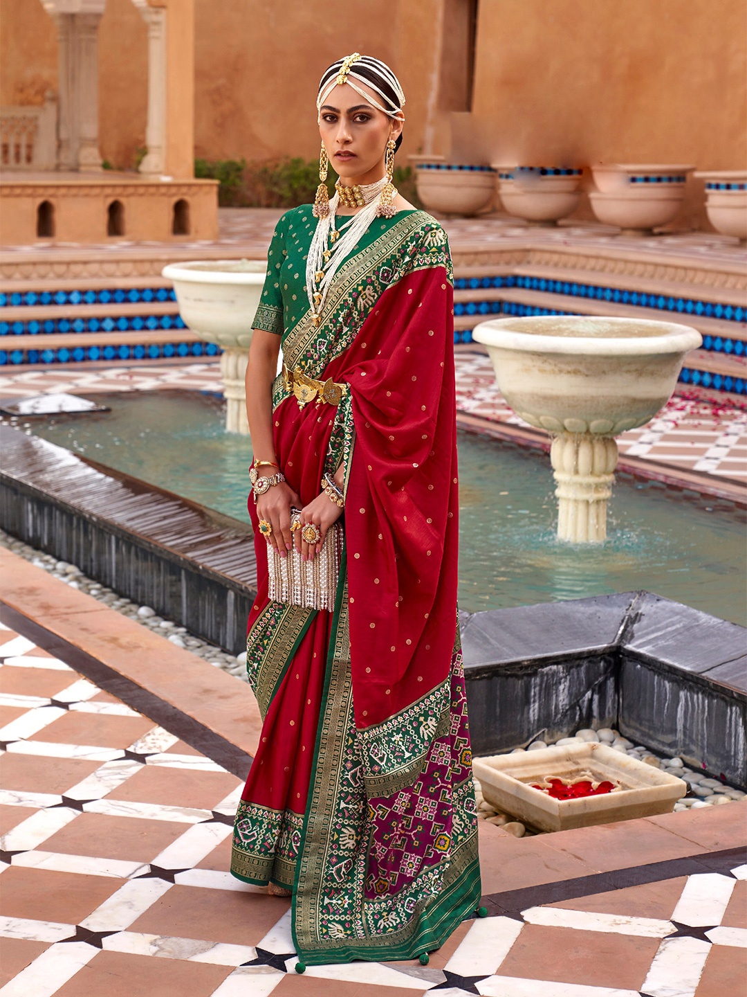 

Mitera Red & Green Ethnic Motifs Woven Design Zari Saree